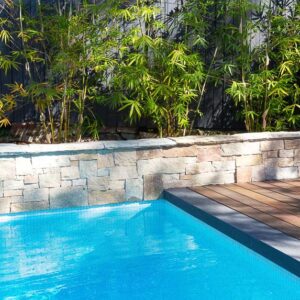 stone pool clad wall