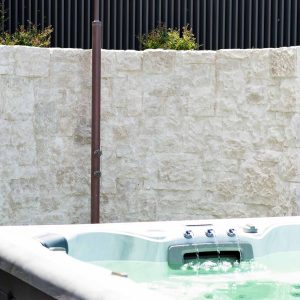 Luxurious sunken spa in outdoor setting