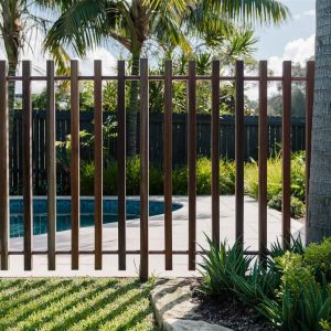 Durable timber fence with natural wood finish.
